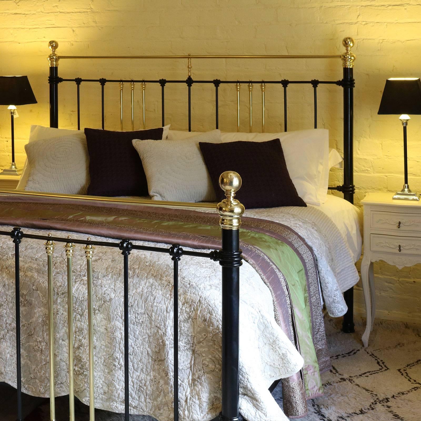 A brass and iron bed finished in black adapted from an original Victorian bed.

This bed accepts a 72 inch wide British super king-size or Californian king-size base and mattress.

The price is for the bed frame alone. The base, mattress, bedding