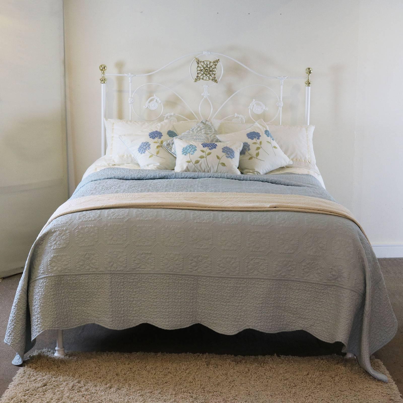 This low end platform bed has an attractive head panel finished in white with decorative castings and central brass star feature. Seventh Heaven have adapted this from an original bed, circa 1880.

This bed accepts a British king-size or American