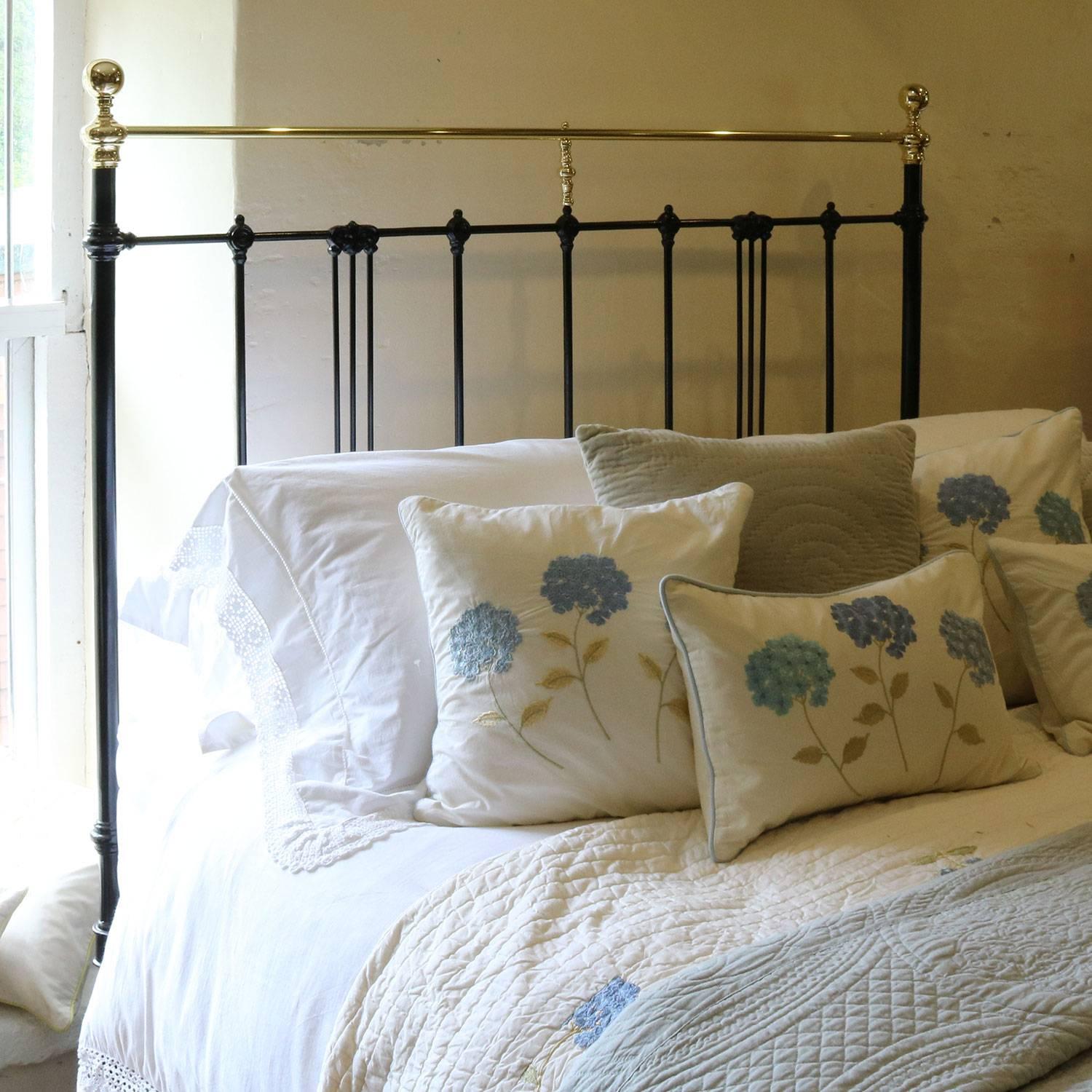 A simple brass and cast iron low ended bed with delicate mouldings. This bed has been adapted from an original frame, circa 1900.

The bed accepts a British king-size or American queen-size base and mattress (60 in wide, 5ft or 150cm).

The price is