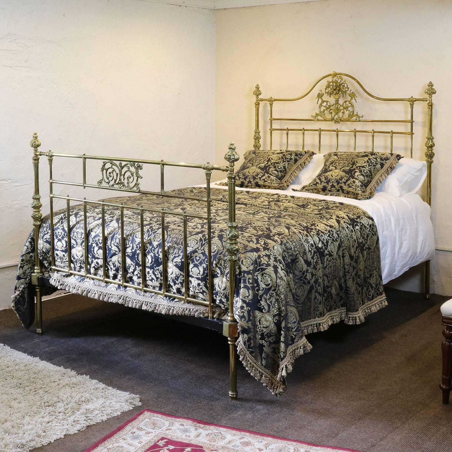 A superb all brass bed with decorative fittings on the posts, central cast brass plaque in the foot board, serpentine top rail on the head panel and ornate plaque in the centre of the head panel depicting mythical birds in foliage.

The brass on the