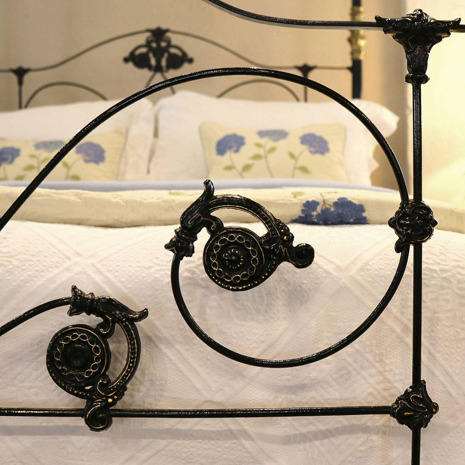 wrought iron four poster bed