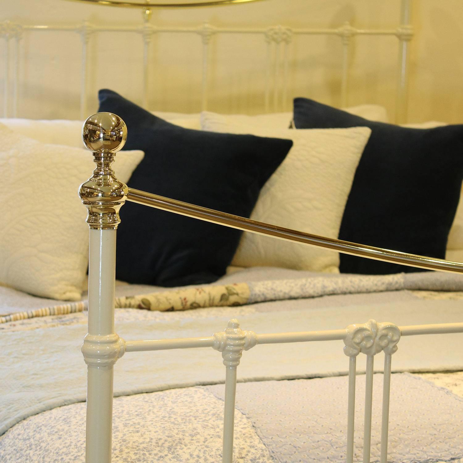 cream iron bed