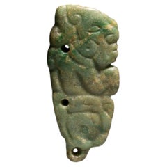 Anthropomorphic pendant. Mayan, c. 300 - 500 AD. Jade. Height 5.8 cm.