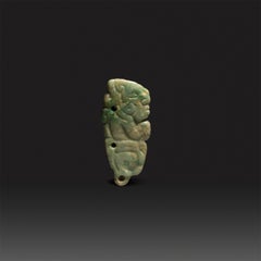 Anthropomorphic pendant. Mayan, c. 300 - 500 AD. Jade. Height 5.8 cm.
