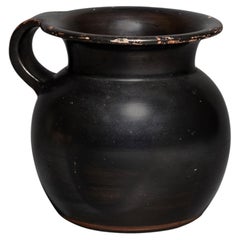 Olpe. Greek, Attic. 5th century BC. Pottery. 9 cm high.