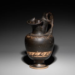 Oinochoe. Ancient Greece. 4th century BC. Pottery. 20 cm height.