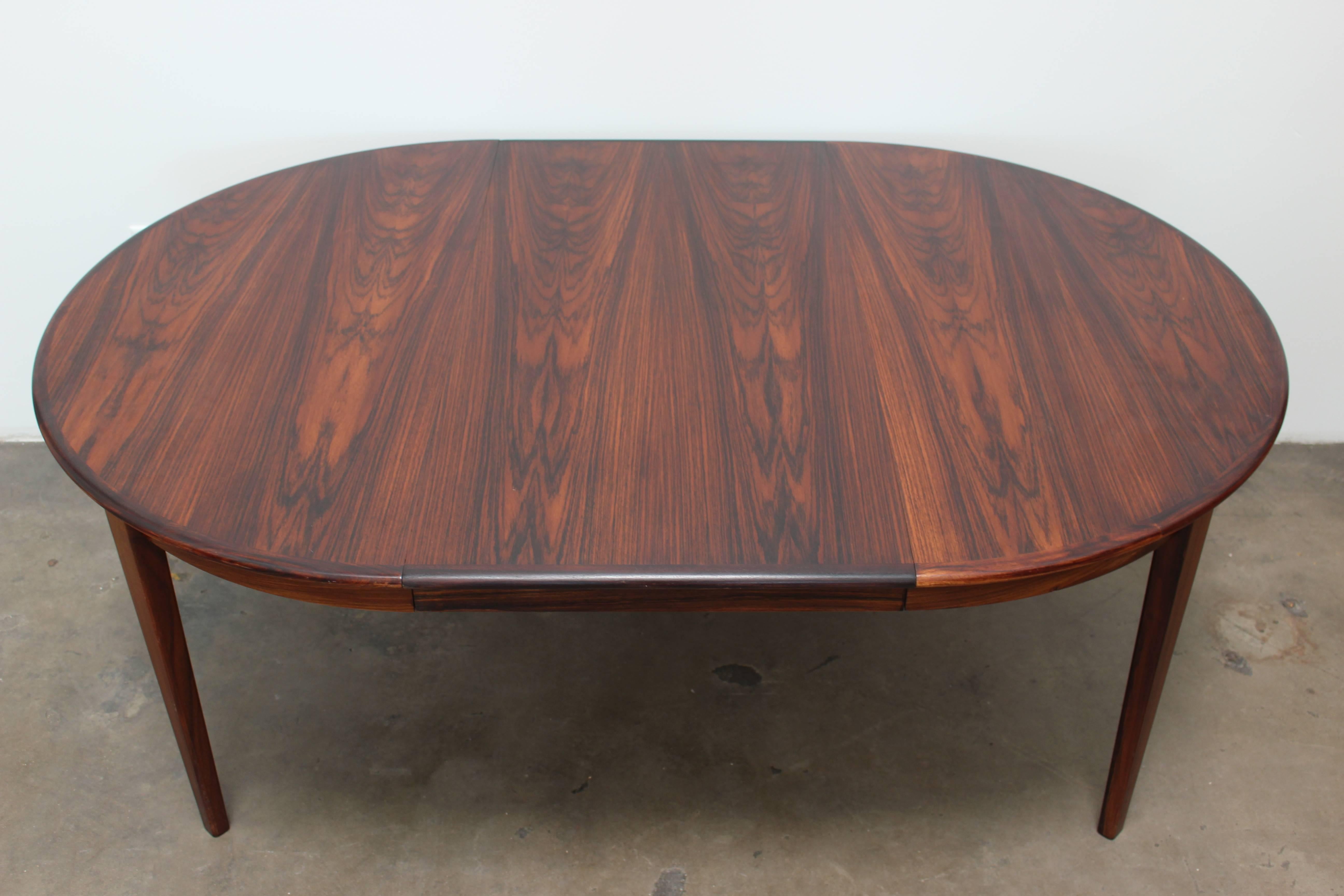 Rosewood Round Dining Table by H. Sign & Sons In Excellent Condition In Houston, TX