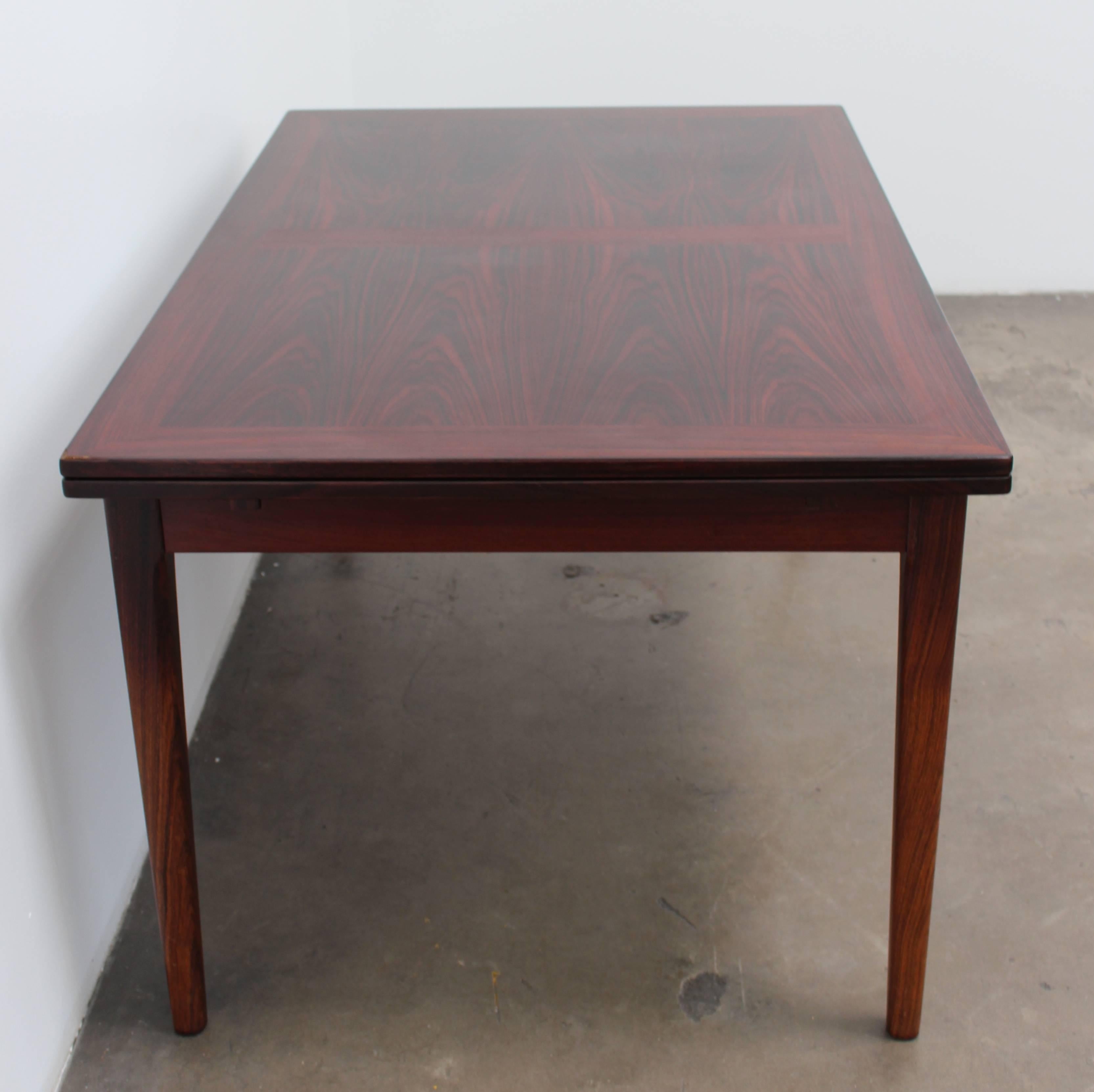 Danish Scandinavian Modern Rosewood Dining Table or Desk with Self-Storing Leaves For Sale