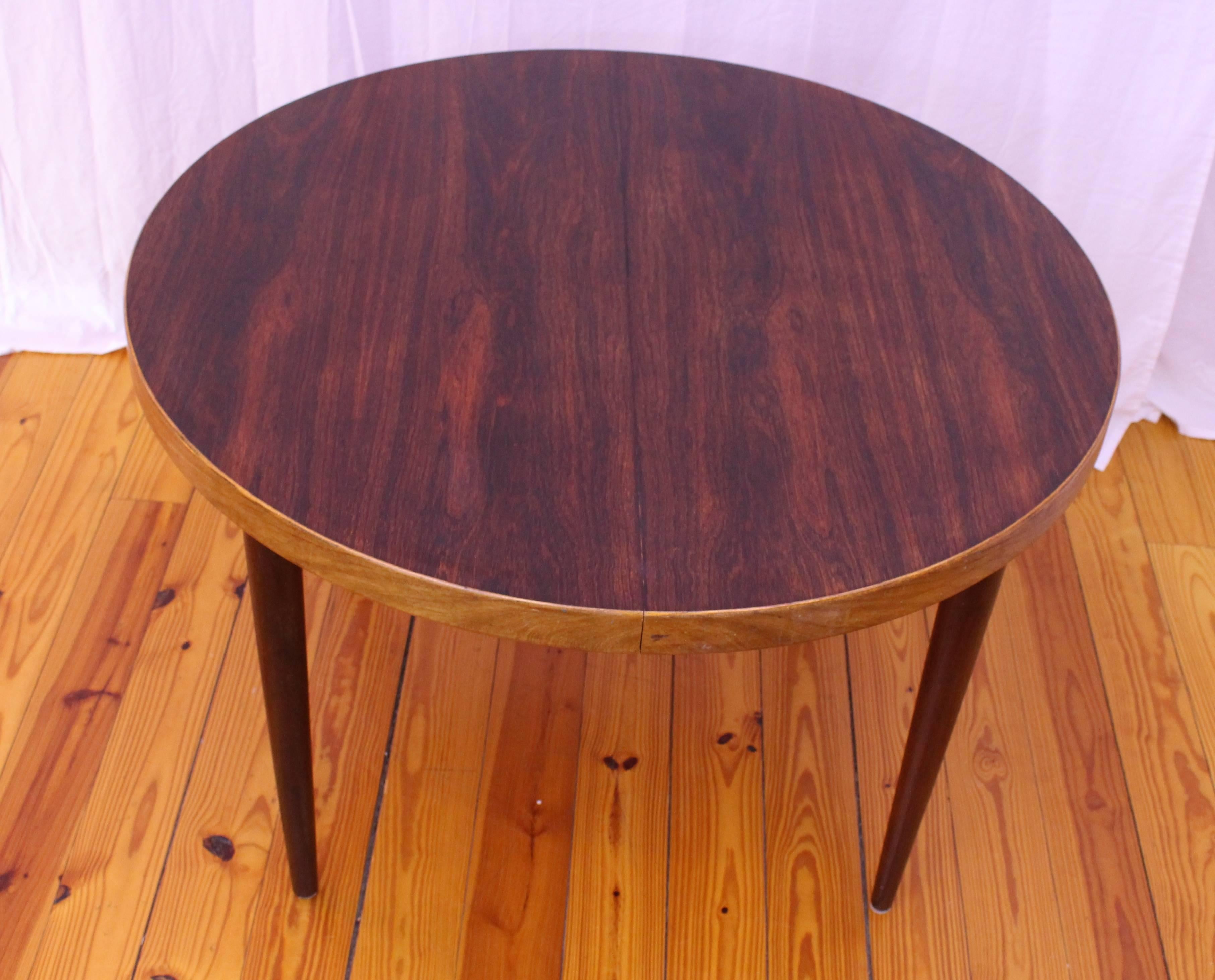Danish, Mid-Century Modern Rosewood and Teak Dining Table by Kai Kristiansen In Good Condition For Sale In Houston, TX