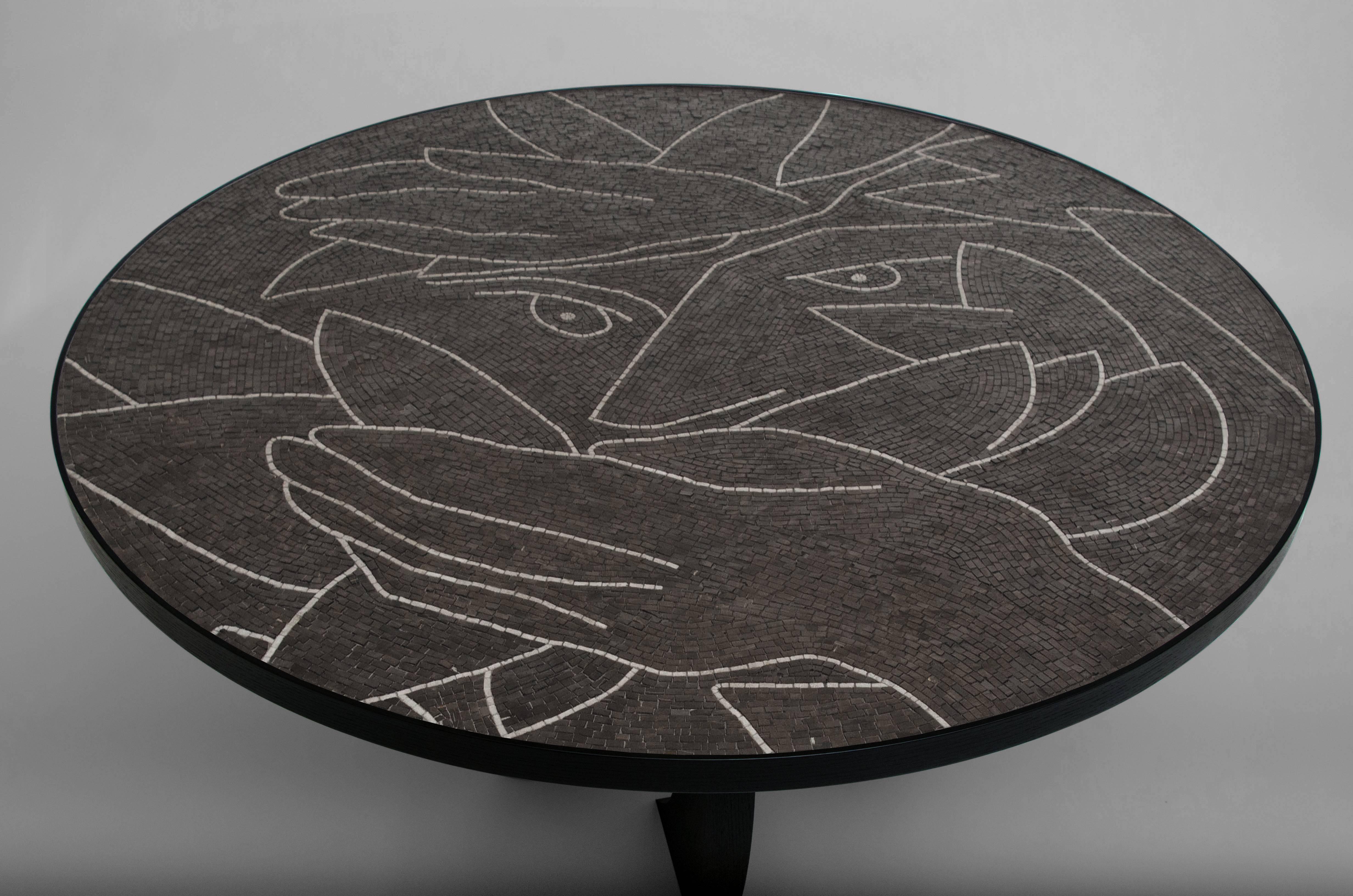 Table featuring custom hand-cut stone mosaic top in Nero Marquina and Bottocino marble with black stained wood base by Kelly Behun studio.
Measures: 72