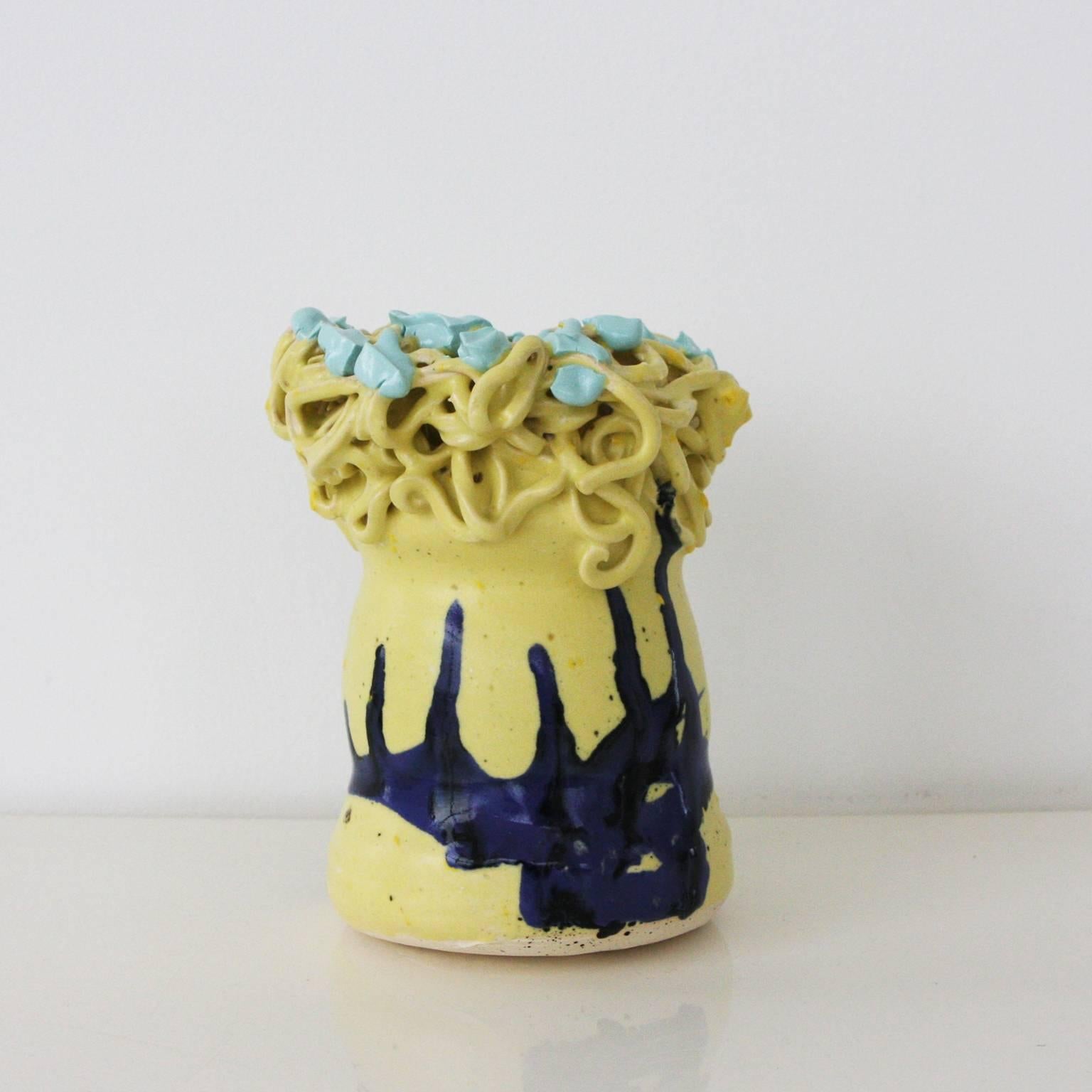 Unique ceramic vessel with multiple glazes by artist Manal Kara.