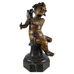 Grand putto baroque français en bronze tenant une tulipe, vers 1880