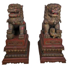 Monumental, Lifesize Pair of Chinese Foo Lions in Red and Gilt Wood
