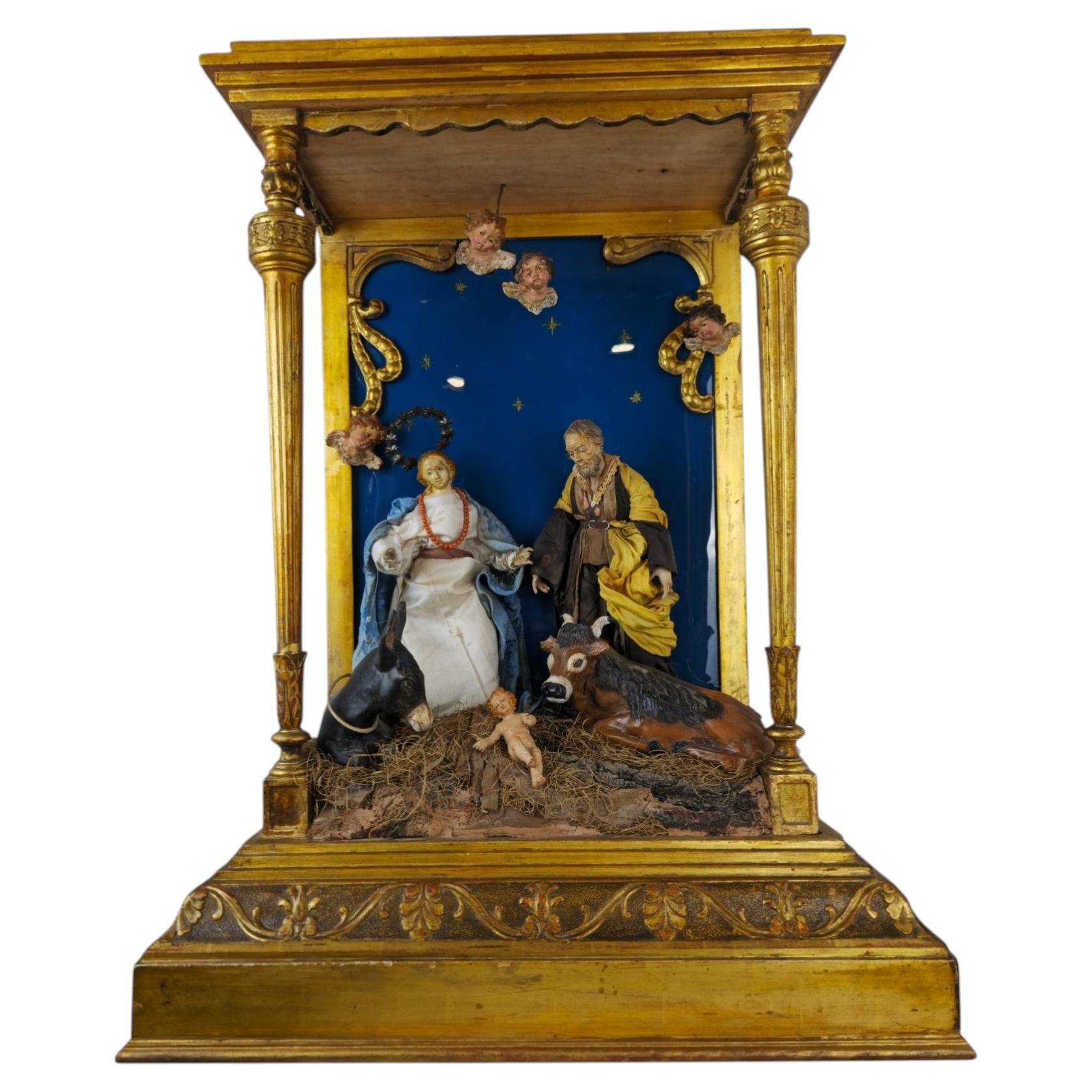 Splendido presepe italiano in teca di legno dorato, 1900 circa in vendita