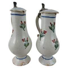 Pair of 18th-Century Faience Narrow-Neck Jugs with Lids