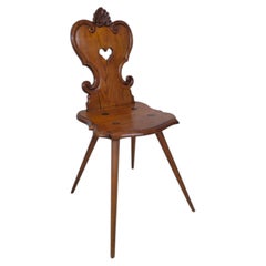 Swiss Carved Wooden Chair with Heart Motif and Shell Crest