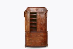 Early 19th Century Flame Mahogany Bow-Front Linen Press