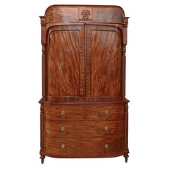 Early 19th Century Flame Mahogany Bow-Front Linen Press