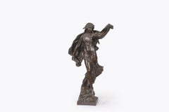 Sculpture en bronze représentant une danseuse, réalisée par Eugène Marioton au début du XXe siècle