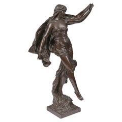 Sculpture en bronze représentant une danseuse, réalisée par Eugène Marioton au début du XXe siècle