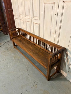 Elegant 19th-Century Walnut Bench with Finely Carved Backrest and Armrests