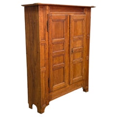 19th-Century Rustic Apricot Wood Wardrobe with Panelled Doors and Decorative Cor