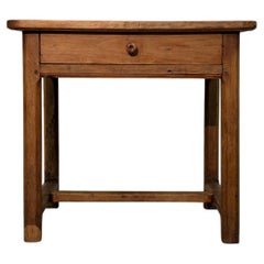 19th-century low walnut table with X-shaped stretcher base