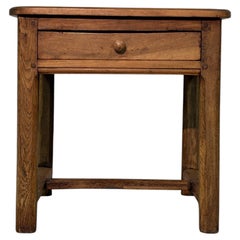 19th-century small low walnut table with X-shaped stretcher base
