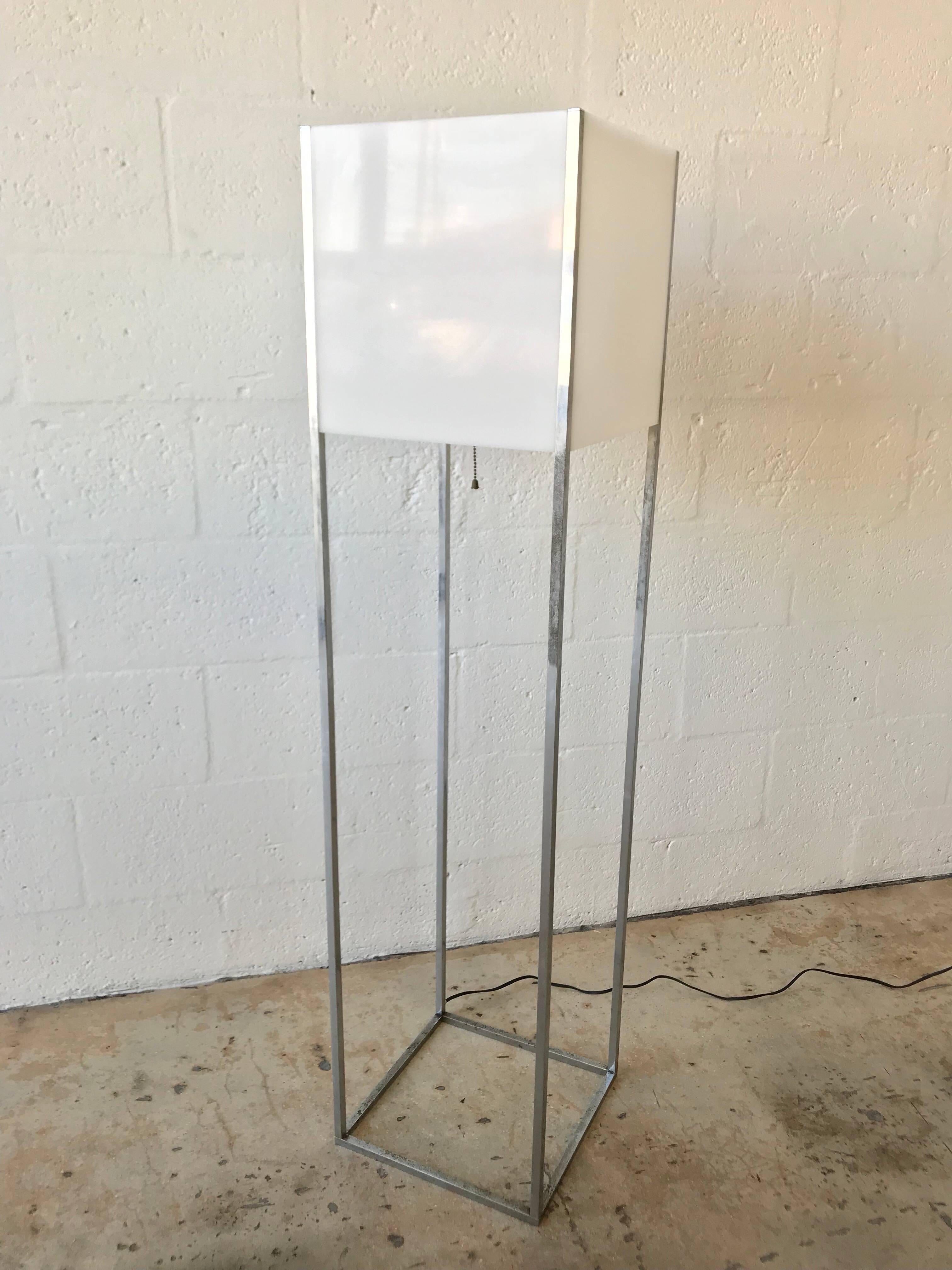 Mid-Century Modern chrome and Lucite floor lamp designed by Paul Mayen for Habitat. Square outlined boxed chrome frame with integrated square white lucite, persplex, plexiglass shade, single bulb with center pull cord.