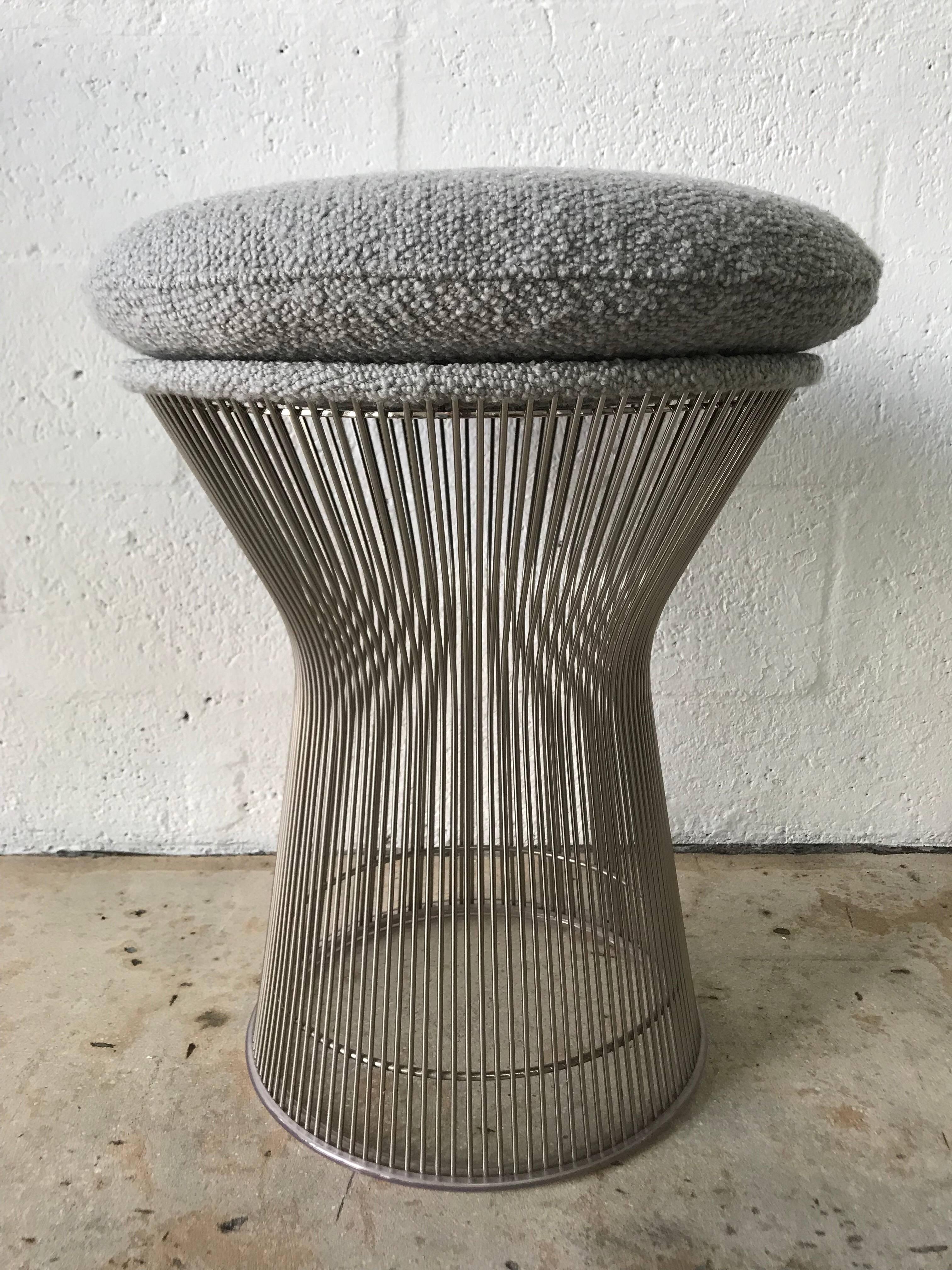 Classic pair of wire stools designed by Warren Platner for Knoll in a grey wool boucle fabric.