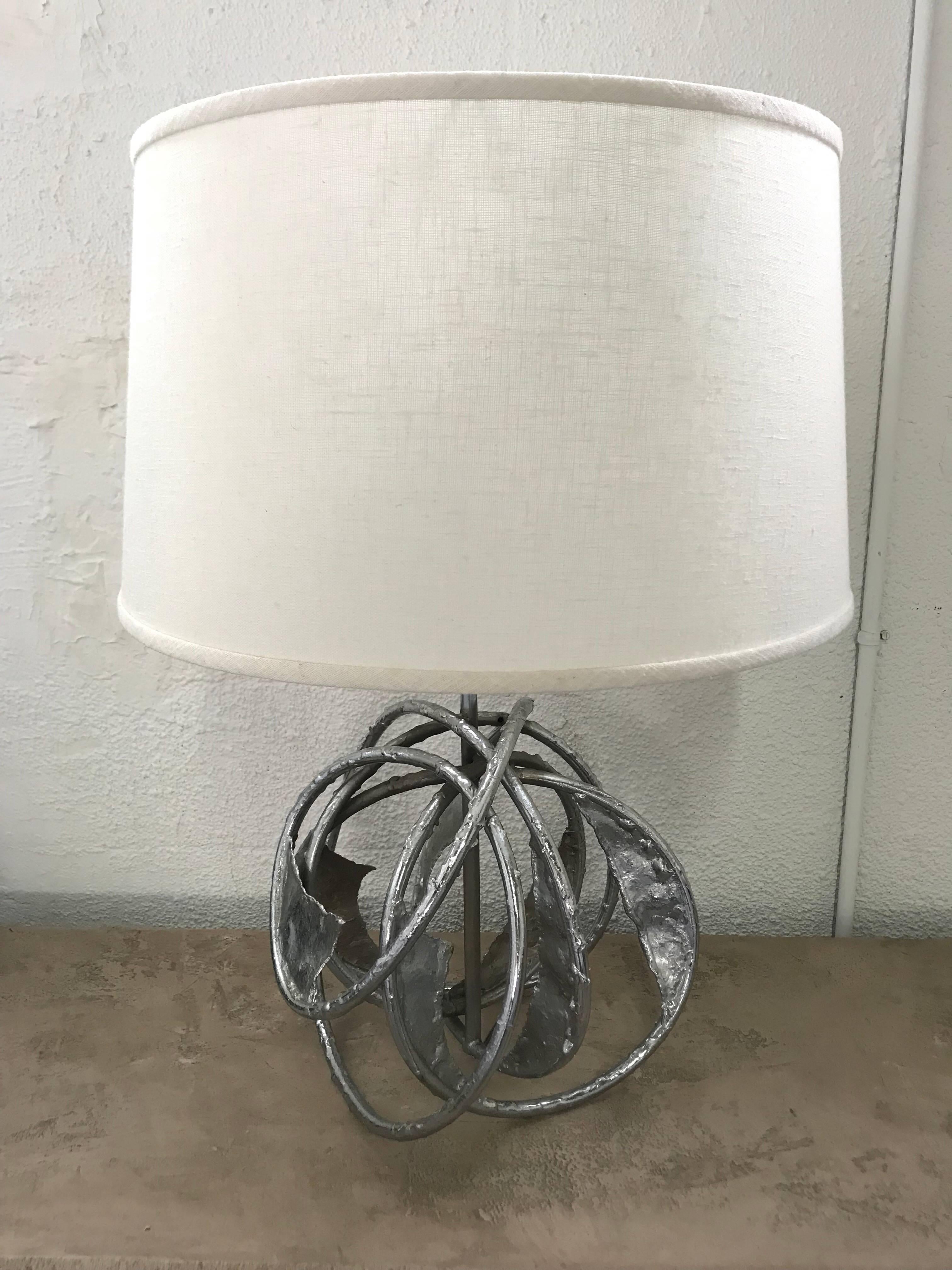 Midcentury unique welded brutalist sculpture lamp rendered in chrome plated steel, different from all angles, Italy, circa 1970s.

shade for display purposes only.