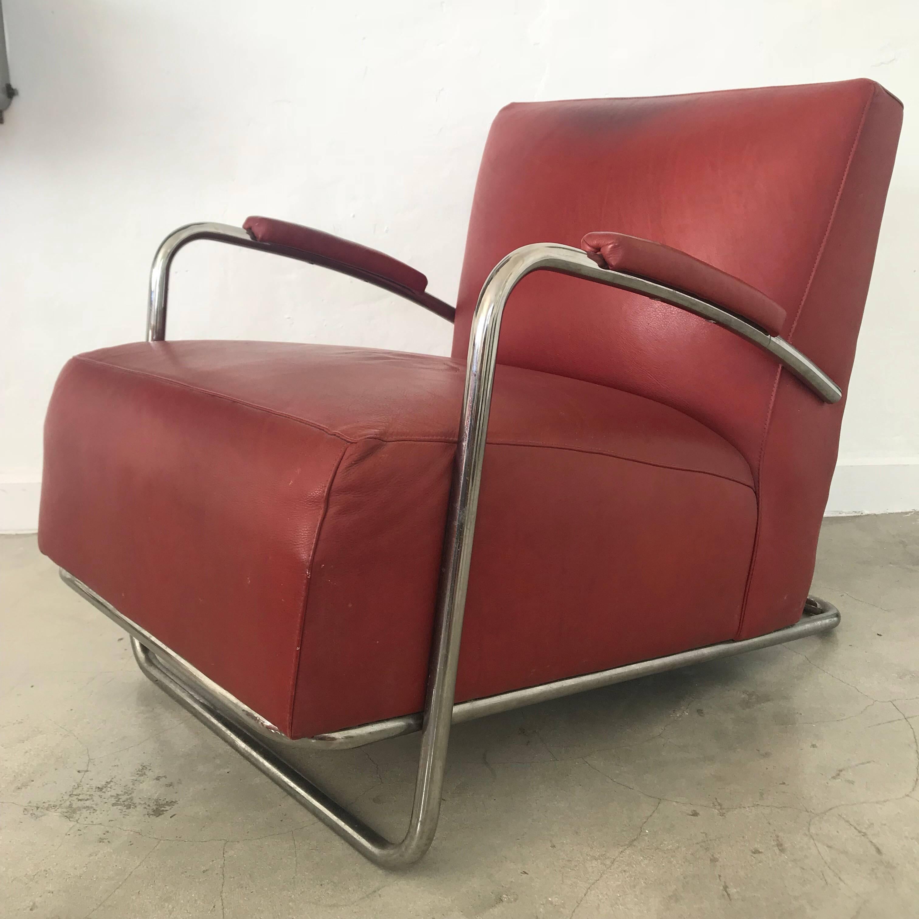 Red leather and tubular chrome chair.