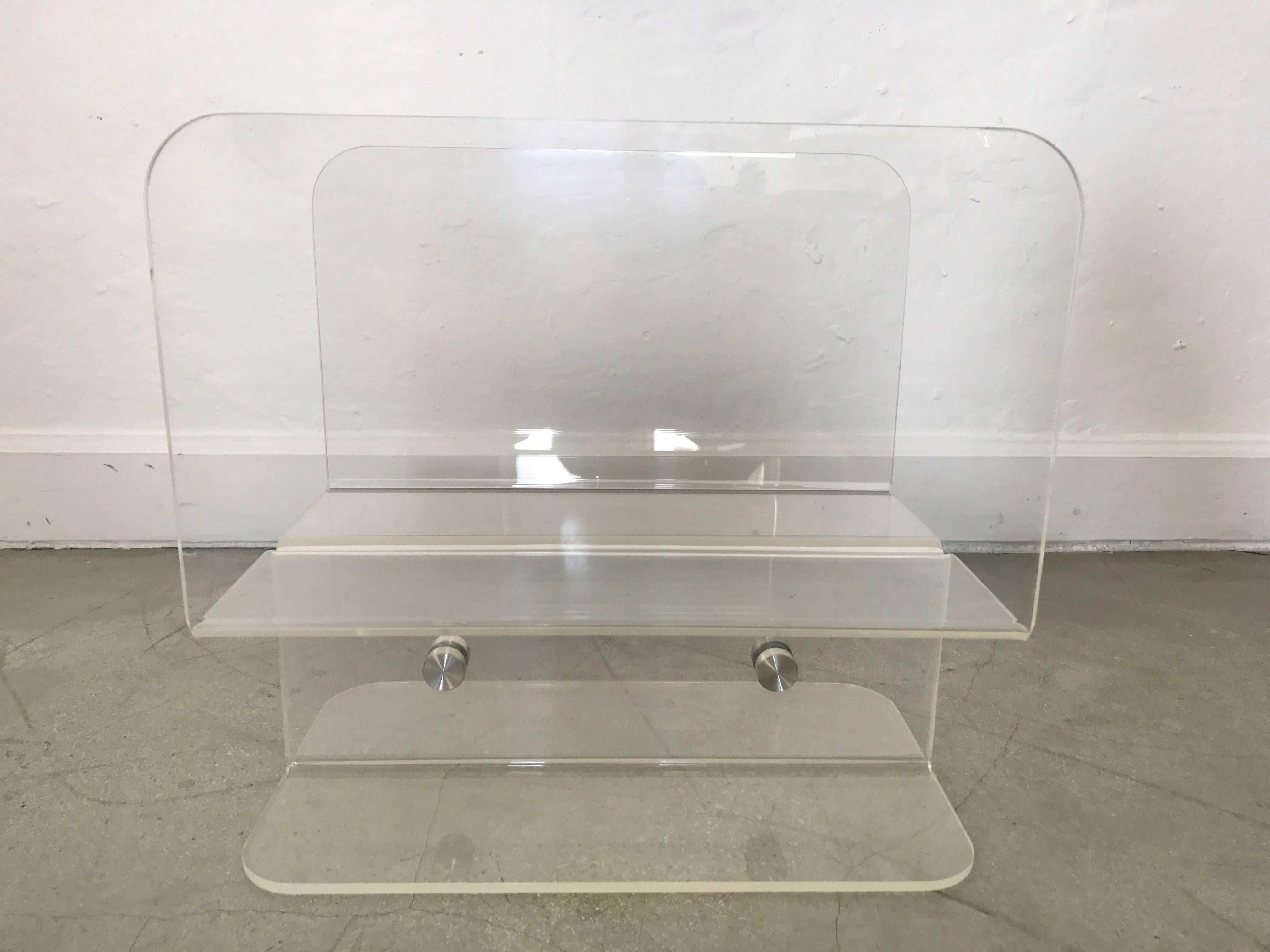Molded Lucite and aluminum magazine or book rack by Charles Hollis Jones.