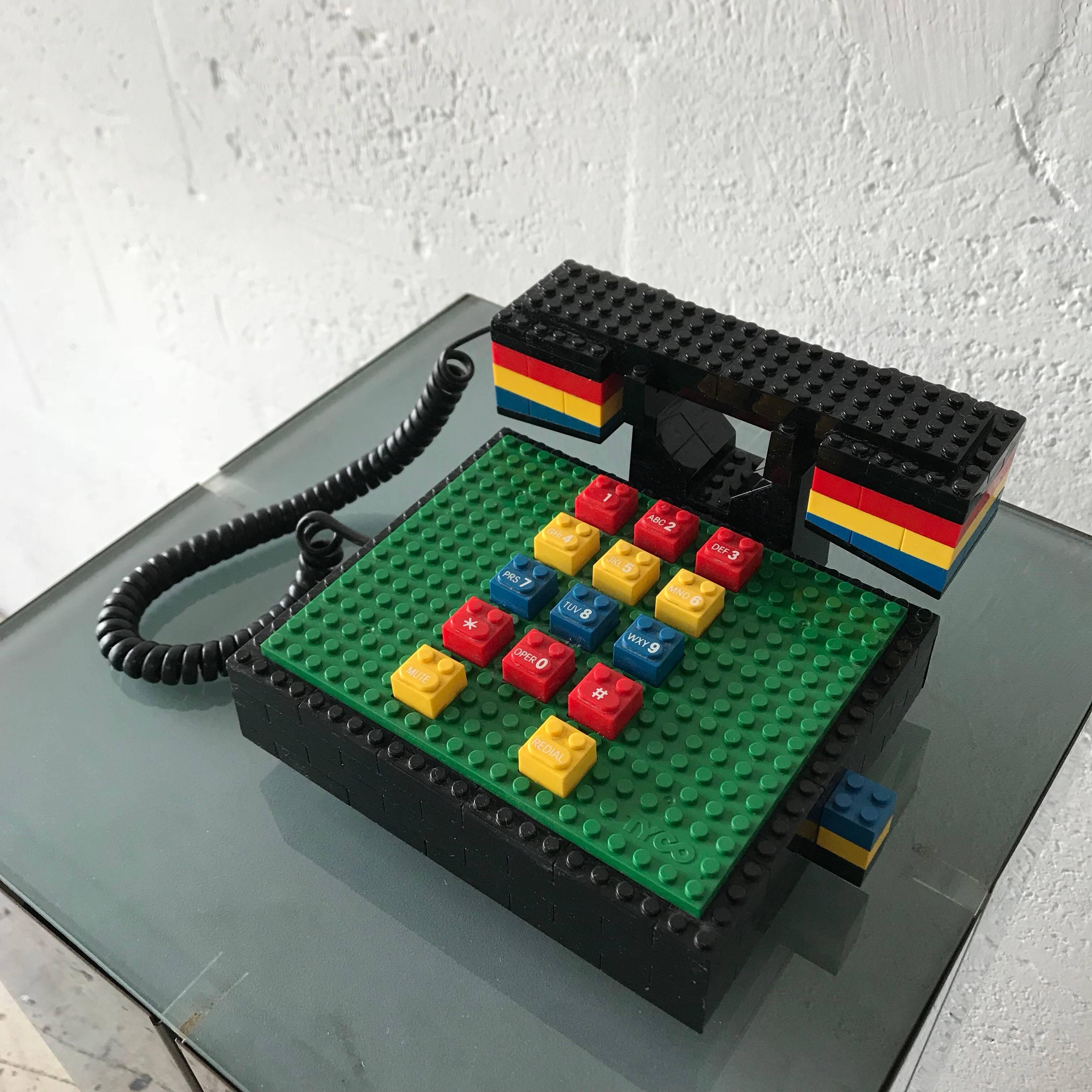 Iconic Postmodern LEGO telephone rendered in multicolored LEGO's by Tyco.