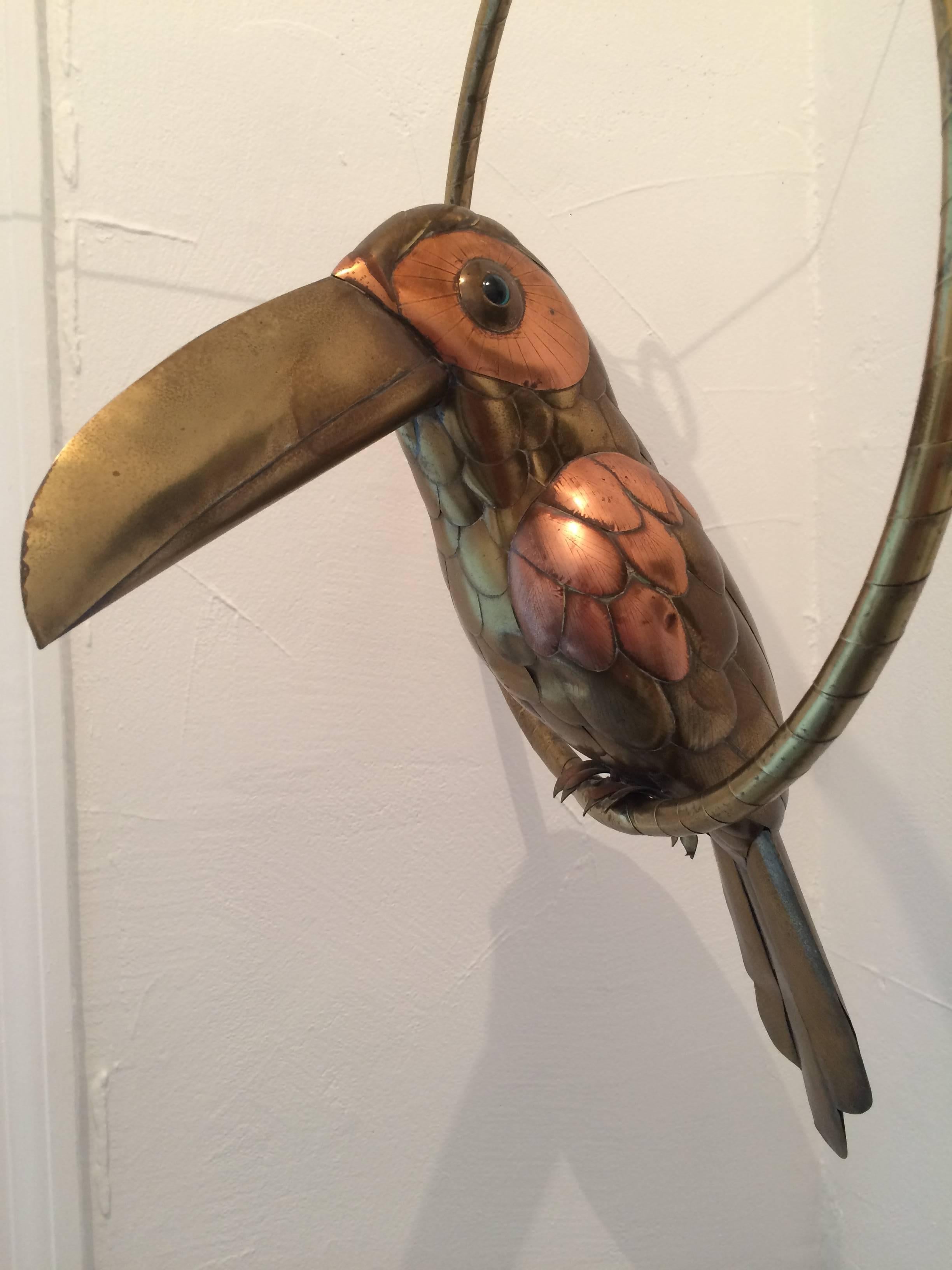 Brass and copper hanging Toucan sculpture by Sergio Bustamante.