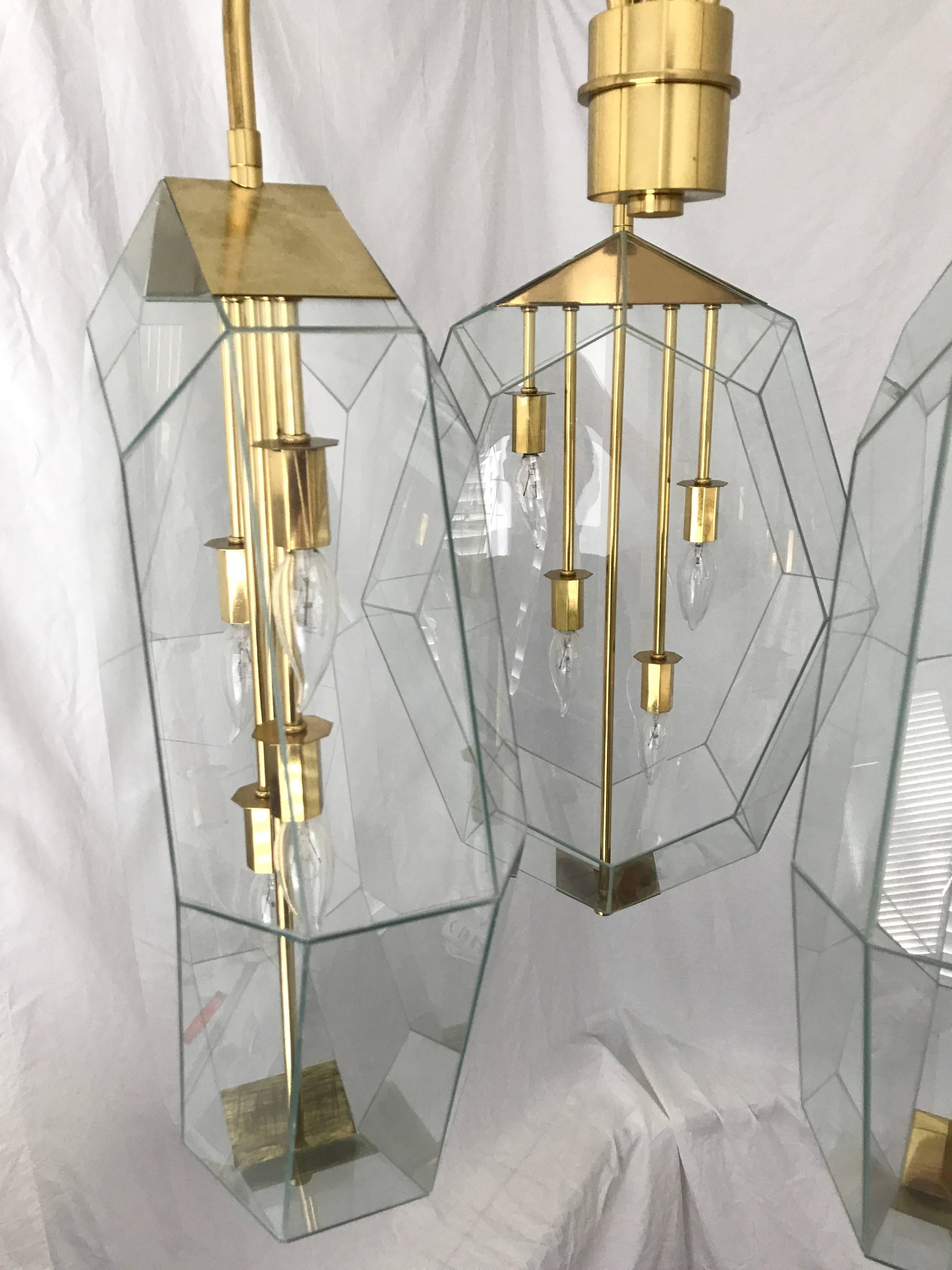Brass and glass faceted geometric chandelier by the original Morrison custom lighting company of Los Angles, 1970s.