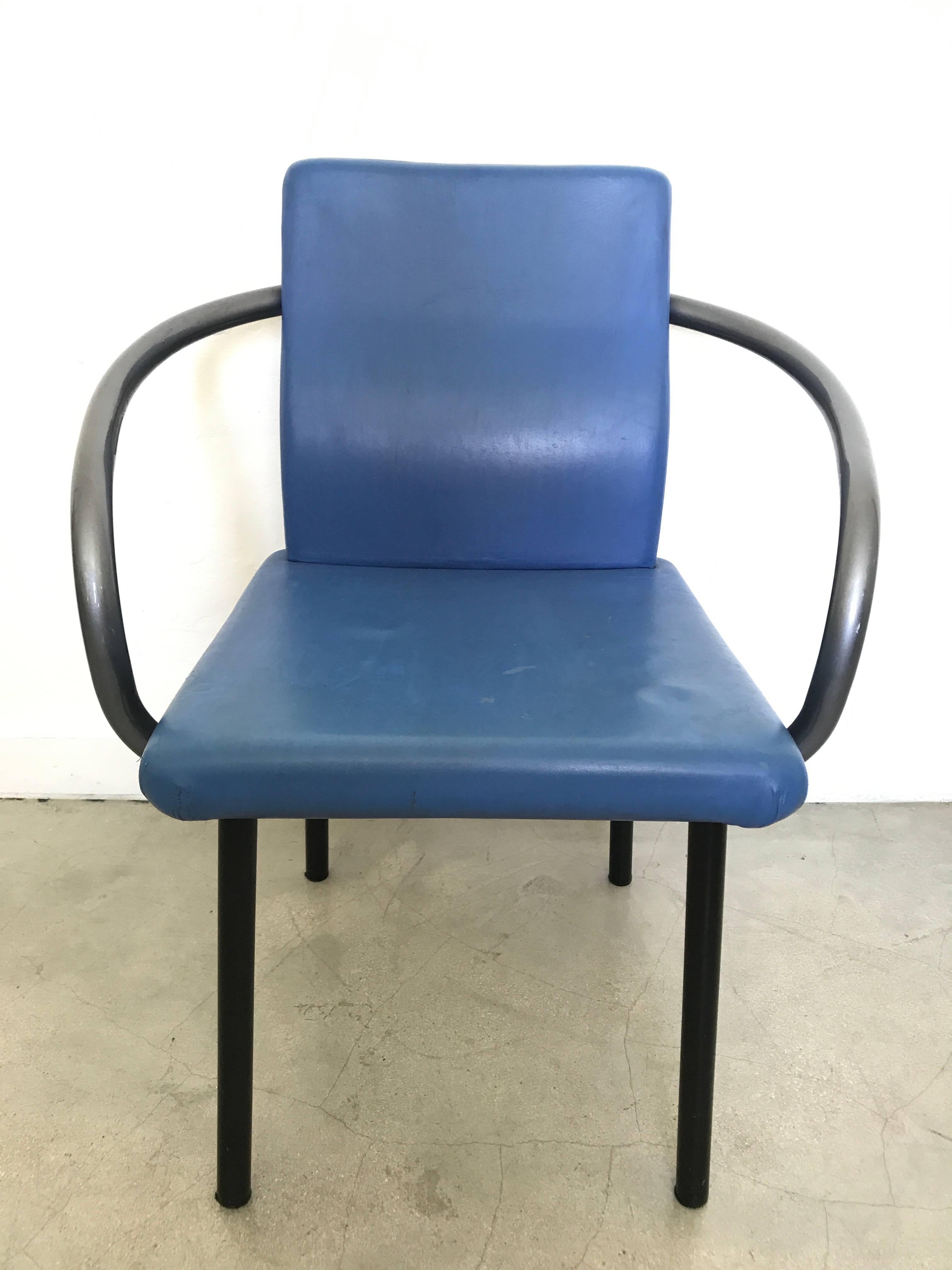 Iconic Postmodern Mandarin chair designed by Ettore Sottsass for Knoll in 1986, with black enameled steel legs, gray enameled steel arms, and painted blue leather seat and back.