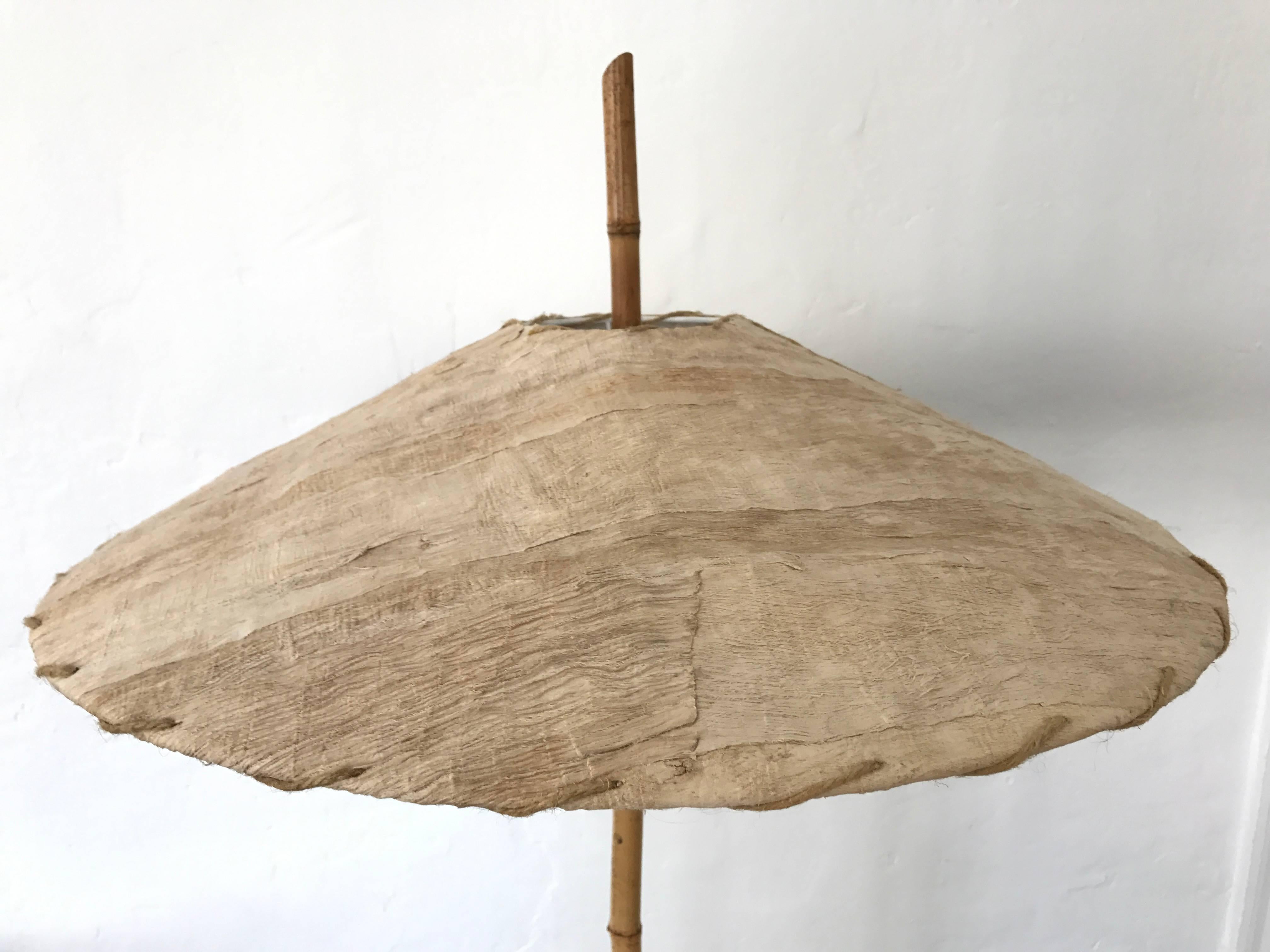 Rare bamboo, handmade palm bark shade and stone base floor lamp by Robert Sonneman for George Kovacs, signed and dated.