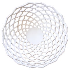 Ciotola decorativa in porcellana bianco caldo con motivo reticolato intagliato a mano