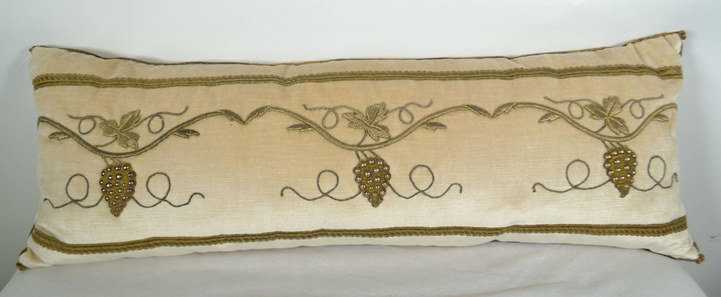 Antique raised gold metallic embroidery pillow, on vanilla velvet. Down filled.