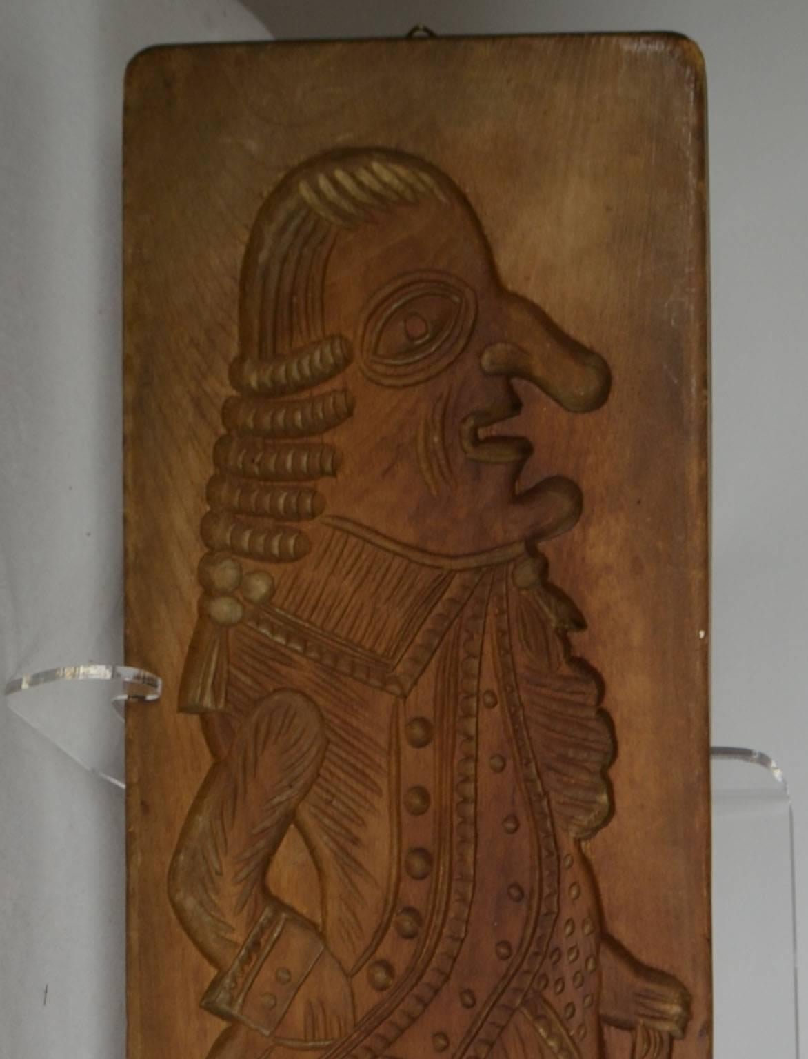 Wooden gingerbread mold (large man with walking stick, with prominent chin and nose).