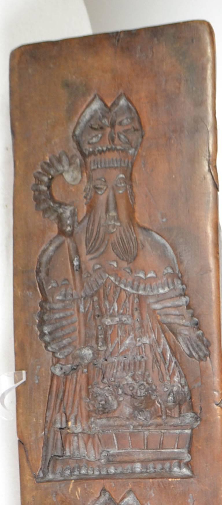 Wooden gingerbread mold (two religious figures or bishops).