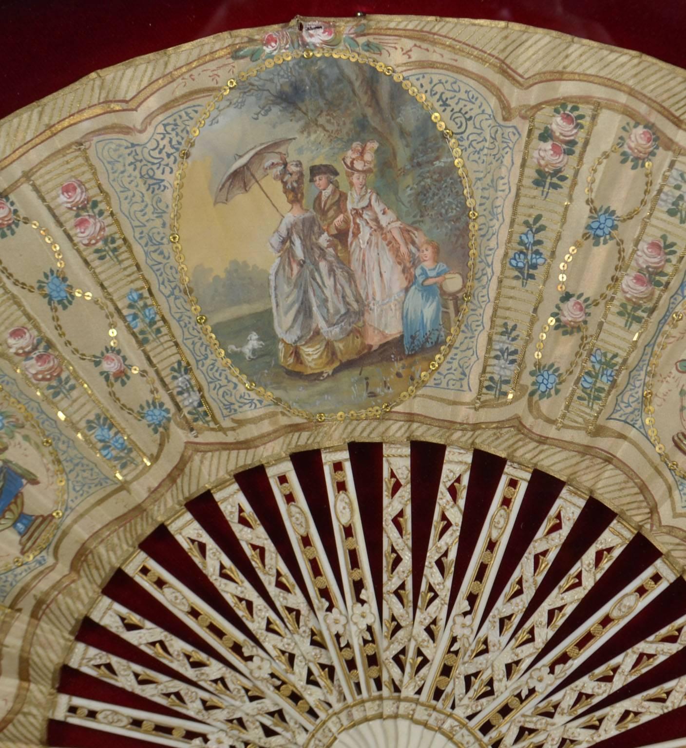 18th century hand-painted fan. (Framed).