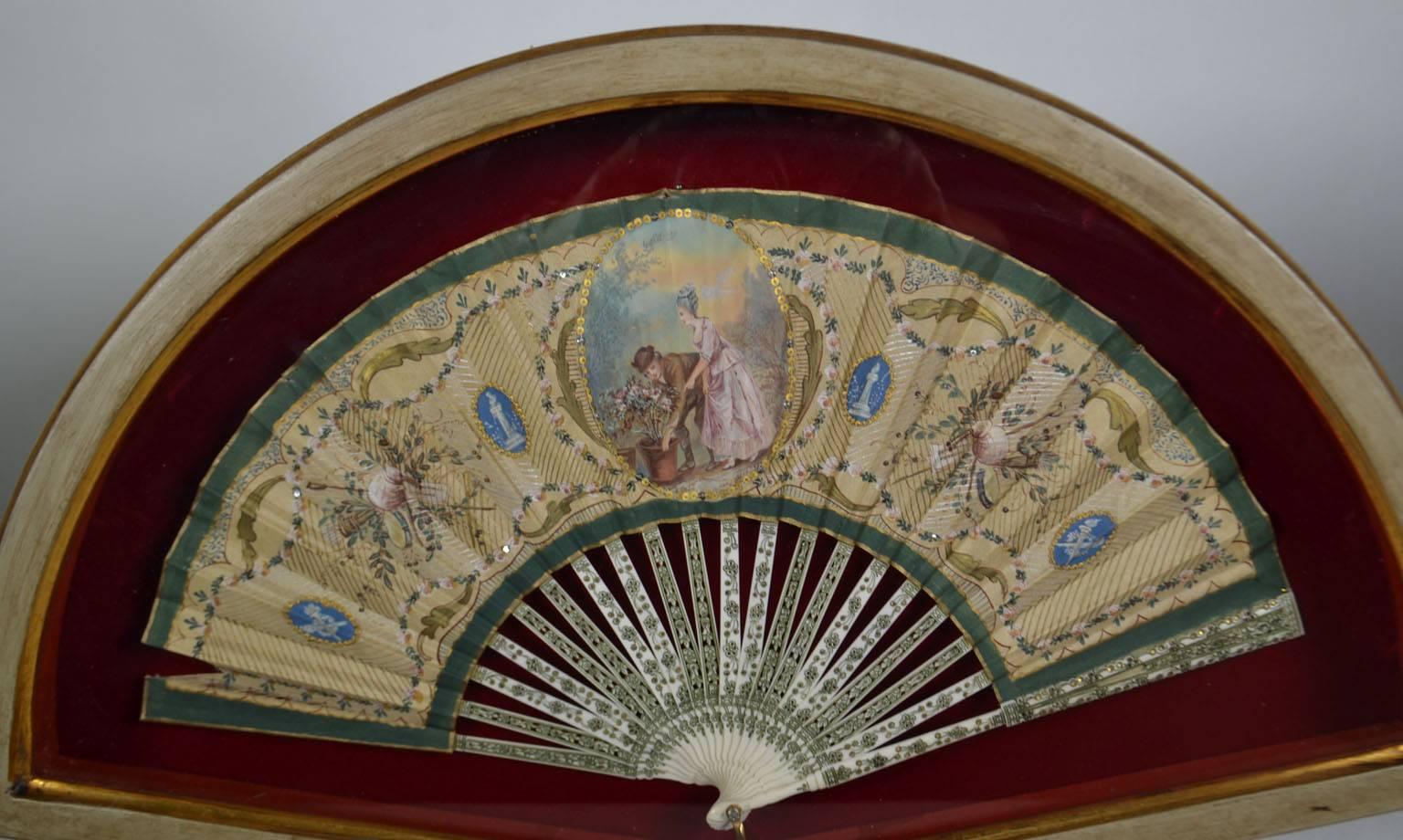 18th century hand-painted fan. (Framed)