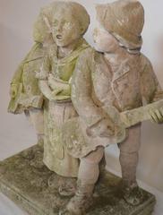 Carved Stone Statue of Children Standing and Singing