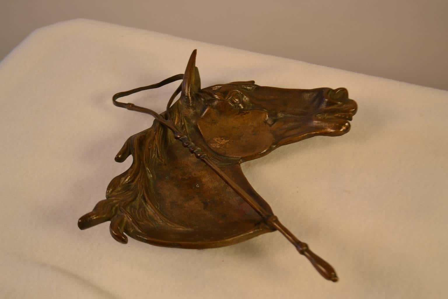 Bronze horse head and riding crop dish, cast in bronze in Chicago by Central pattern foundry, original Patina, beautifully detailed casting.