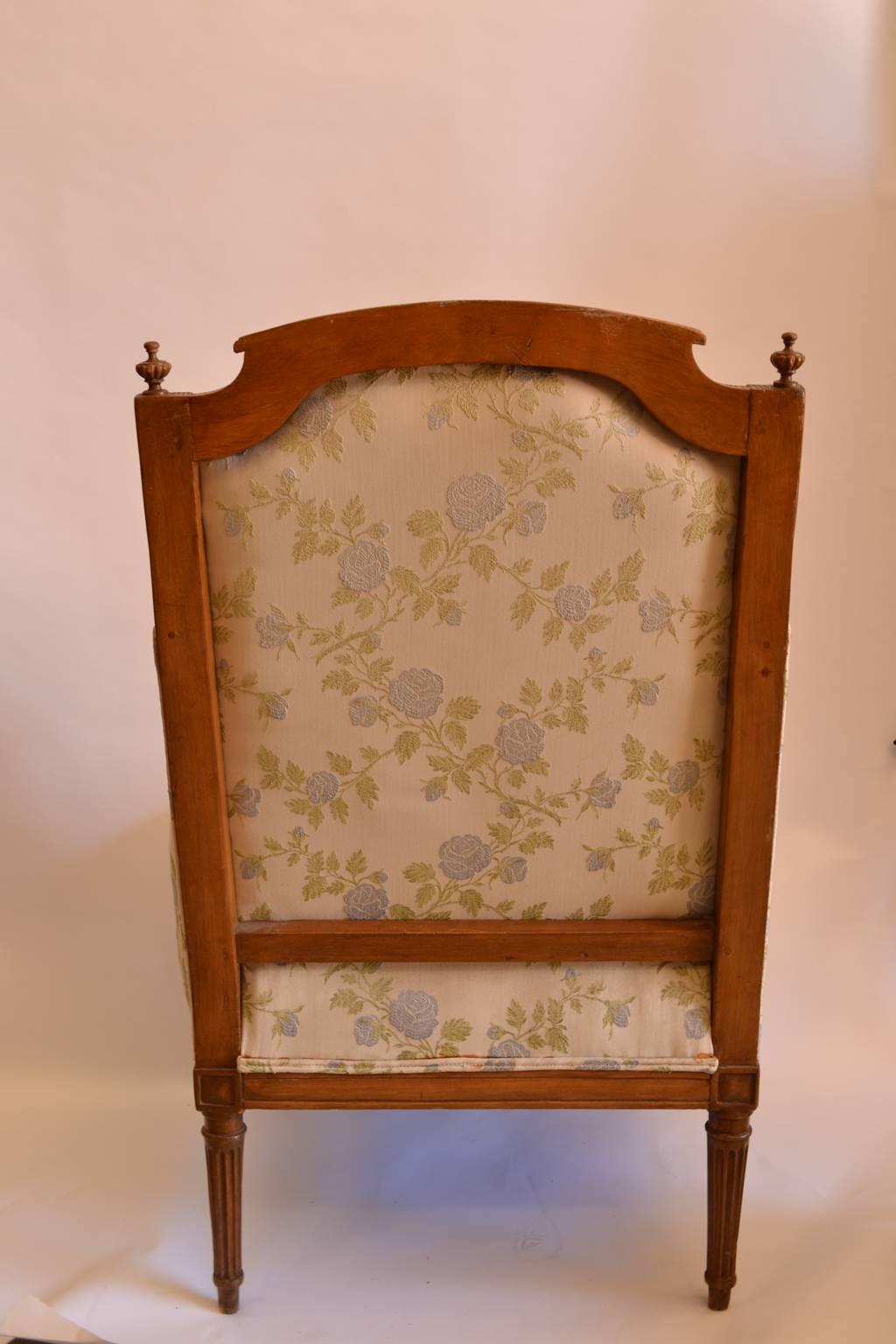 French Louis XVI Carved Walnut Bergère For Sale