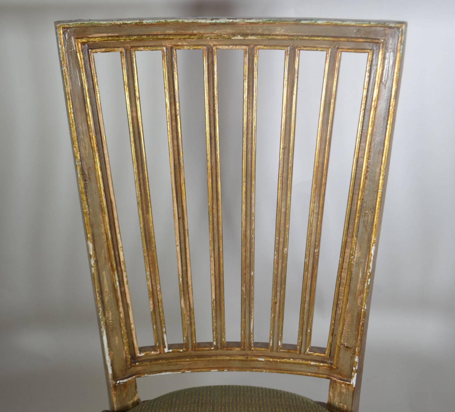 Wood Suite of Eight Parcel-Gilt and Polychromed Dining Chairs For Sale