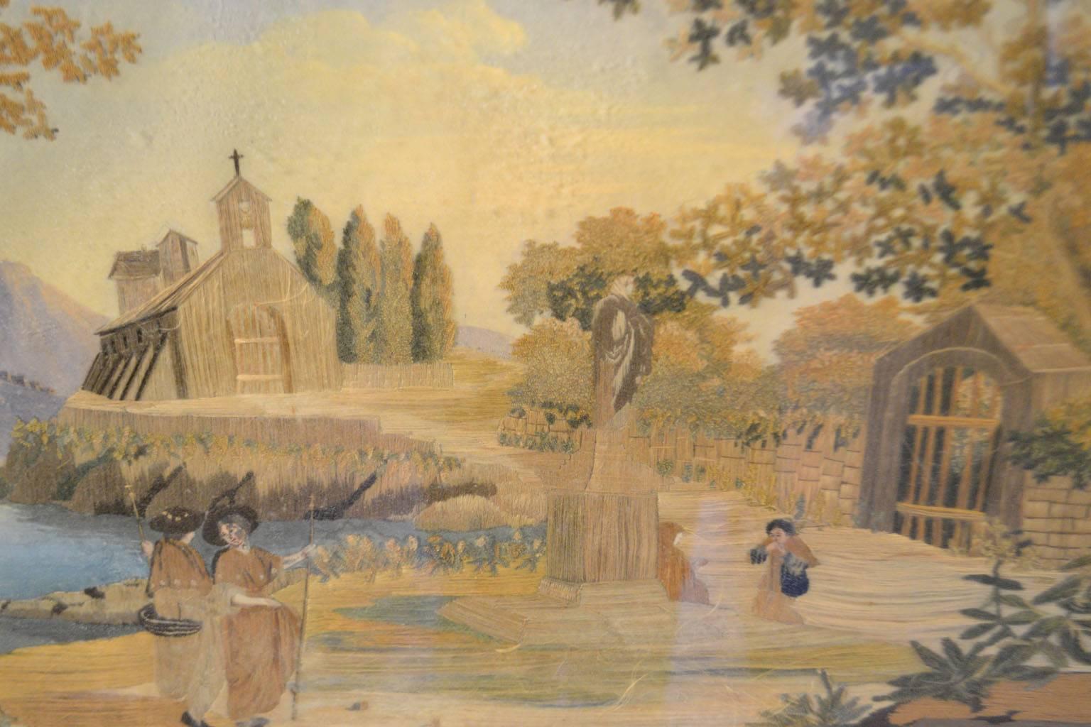 Britische Regency-Nadelarbeit Momento Mori, erstes Viertel des 19. Jahrhunderts, auf Aquarellgrund, mit der Darstellung eines Friedhofs mit zwei Trauernden an einem Grab, zwei Frauen im Vordergrund und einer Kapelle am See mit Bergen in der Ferne,