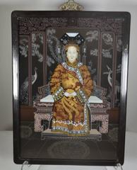 Pair of Chinese Reverse-Painted Glass Portraits